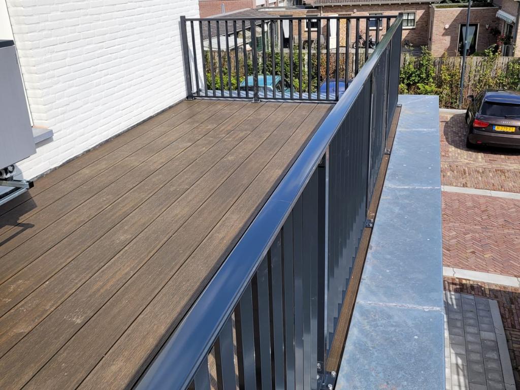 Mag een dakterras op een uitbouw